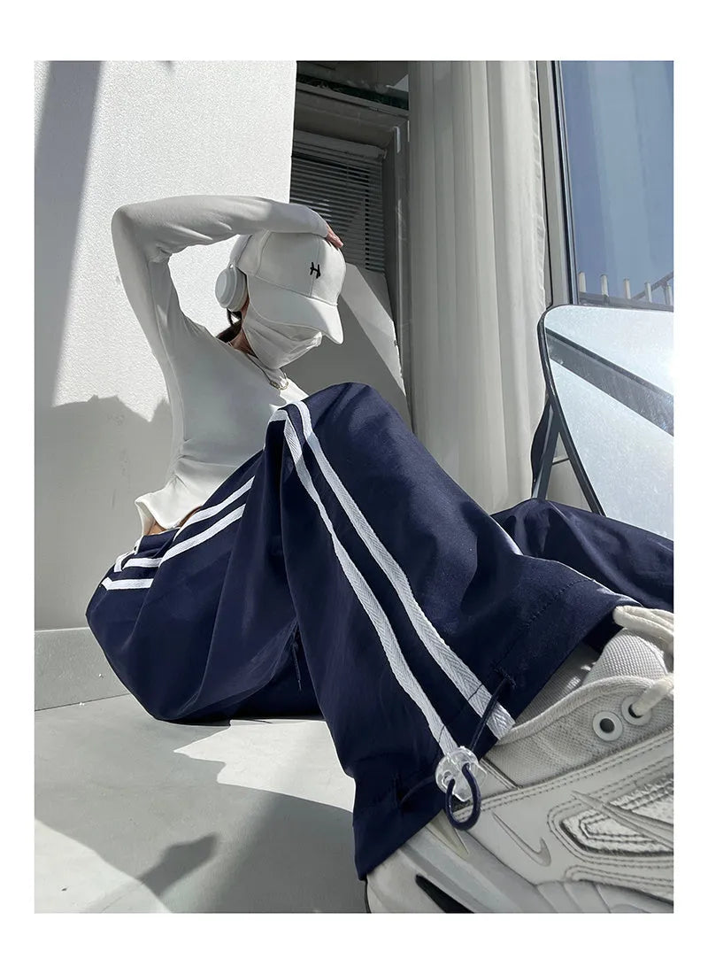 Women's ribbon contrast colour loose straight leg draping trousers in white and navy blue