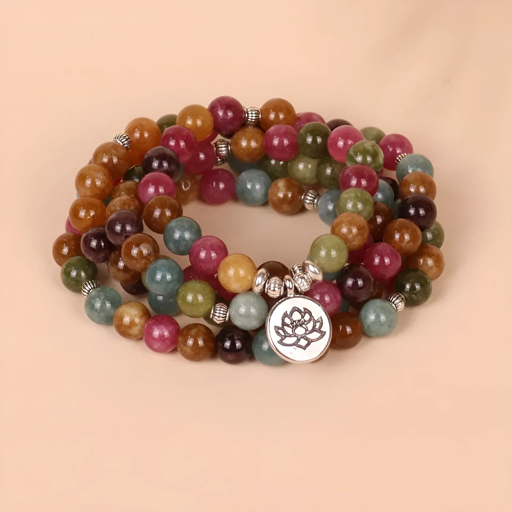 108-bead lotus hanging bracelet with tourmaline-coloured alloy beads on adjustable string