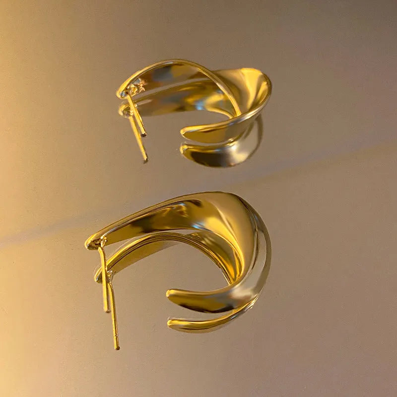 Twisted geometric metal earrings with gold or silver electroplated finish
