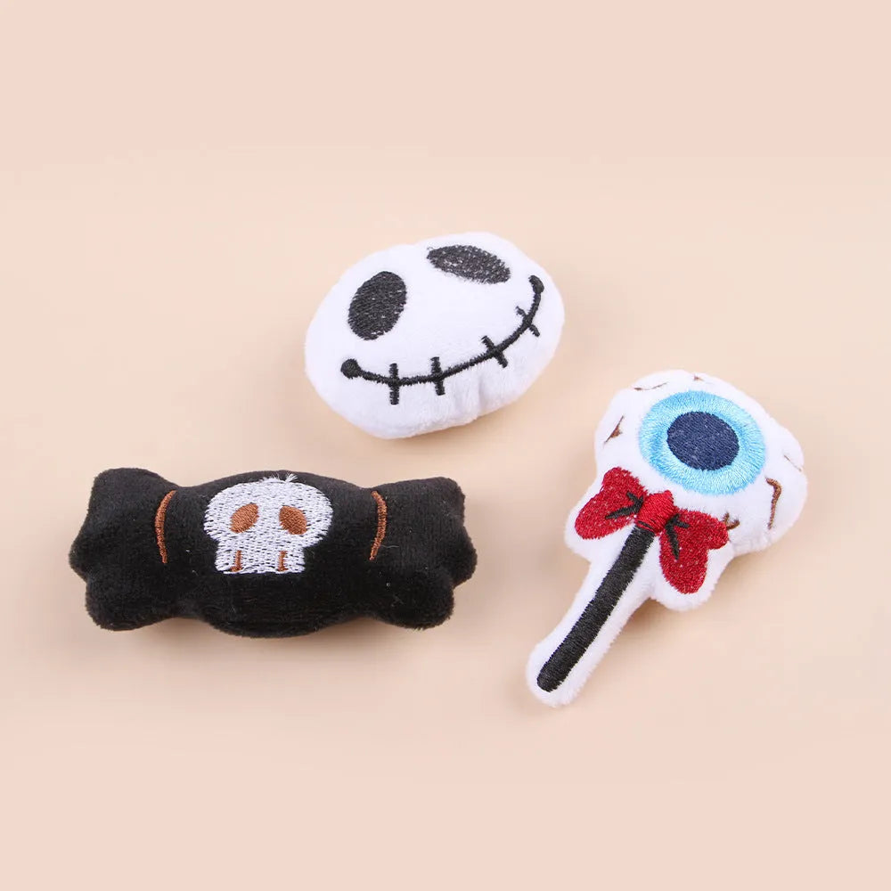 Plush cat teaser wand with colourful pom-pom attachment in candy pink design