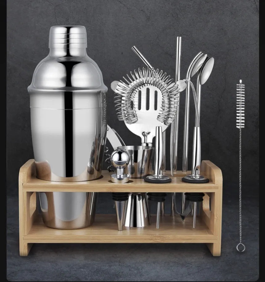 23-piece stainless steel cocktail set with acrylic shaker on home bar