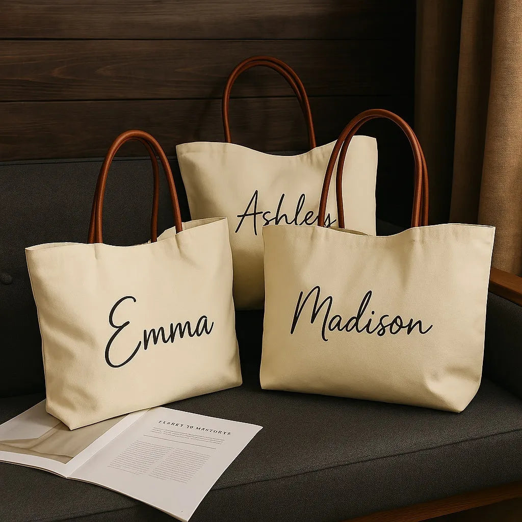 Beige white canvas tote bag with shoulder straps and front slip pockets