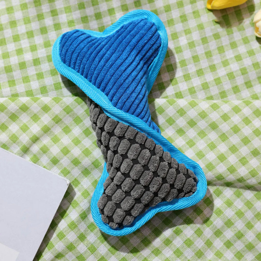Blue bone-shaped teddy dog toy with squeaky ball inside and corn fleece lining