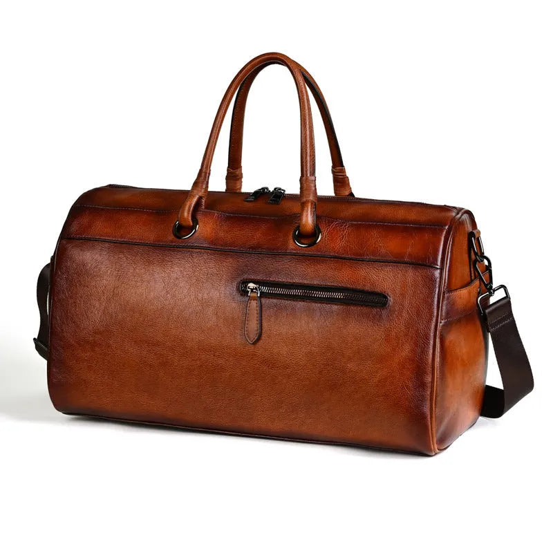 Handmade retro brown leather satchel with large capacity and an expandable design.