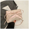 A black horizontal square underarm crossbody bag with large capacity and visible sewing lines.