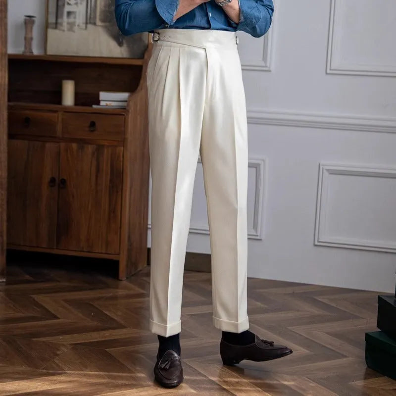 Men's high waist straight leg casual trousers in black polyester fabric on a hanger.