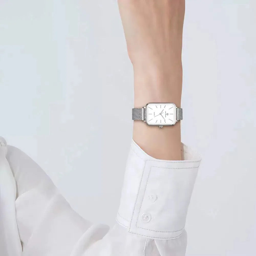 Women's waterproof quartz watch with woven steel band and alloy case in rose gold or silver