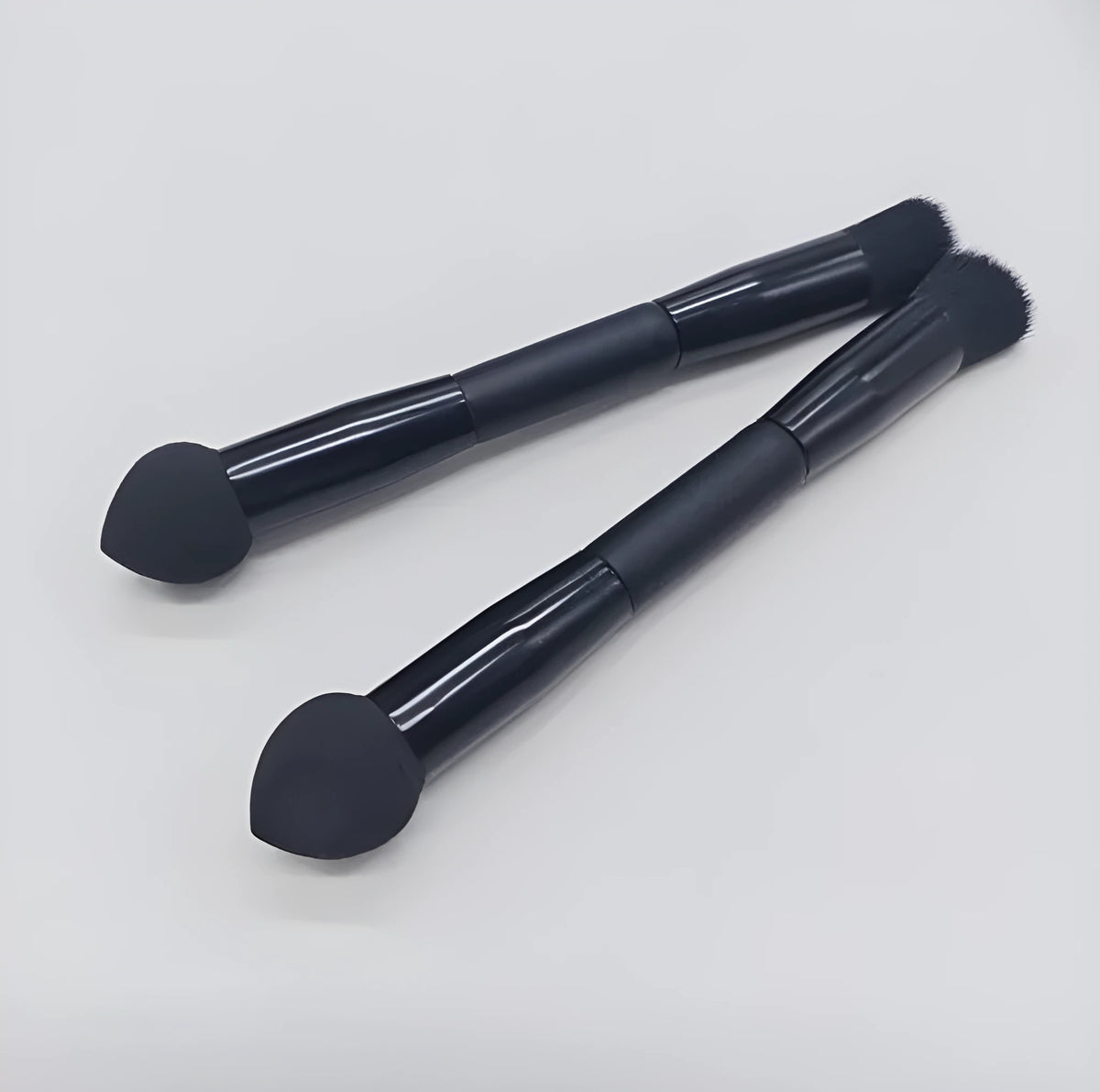 Double-headed miter sponge concealer brush with wooden handle and black artificial fibre bristles