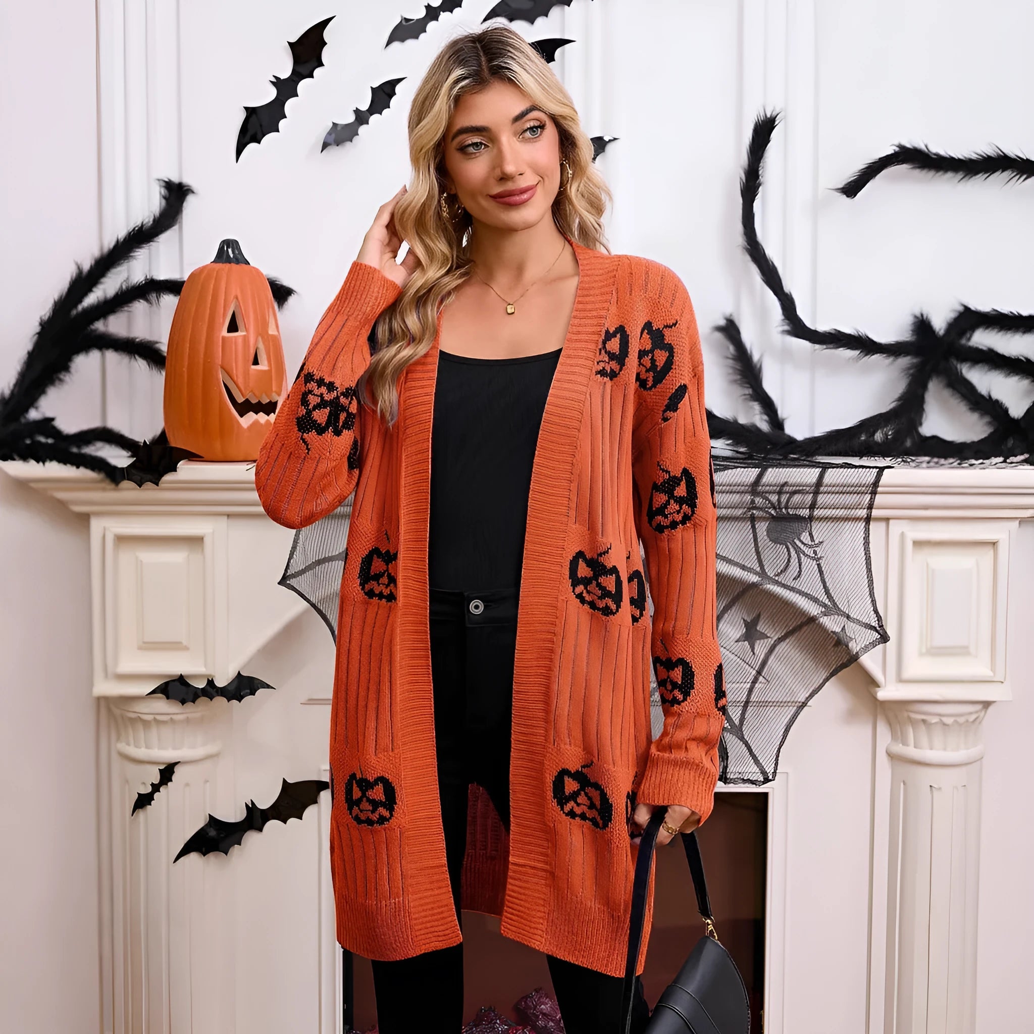 Women's black Halloween cardigan with pumpkin head jacquard pattern, medium length acrylic knit