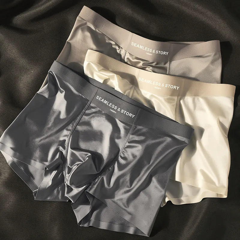 Men's ice silk underwear in mid-waist satin knit design showing coffee, light grey, white and blue colour options