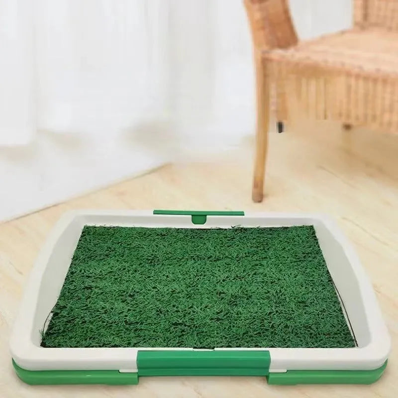 Green artificial grass dog toilet patch measuring 69cm square with three-layer construction for indoor pet training