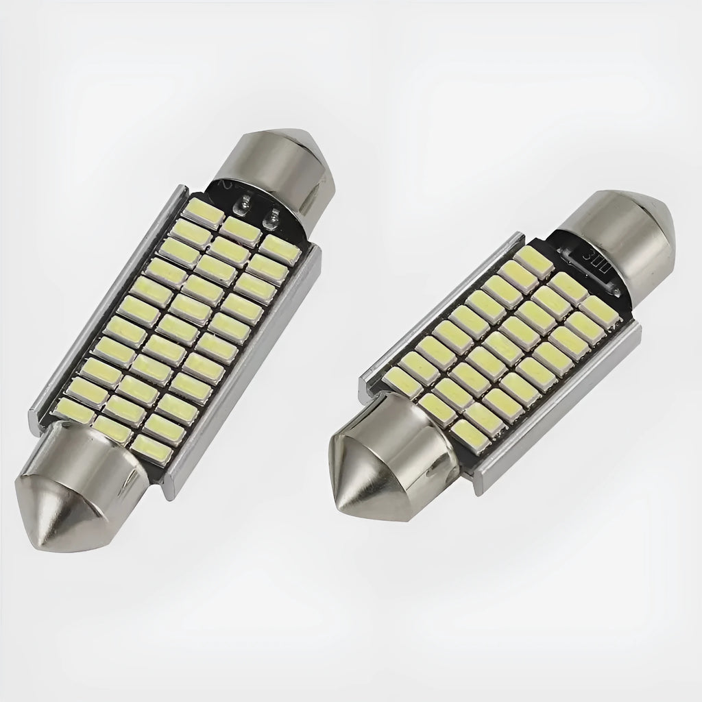 Car interior LED decoder light with aluminium housing and double-tip metal connector in white.