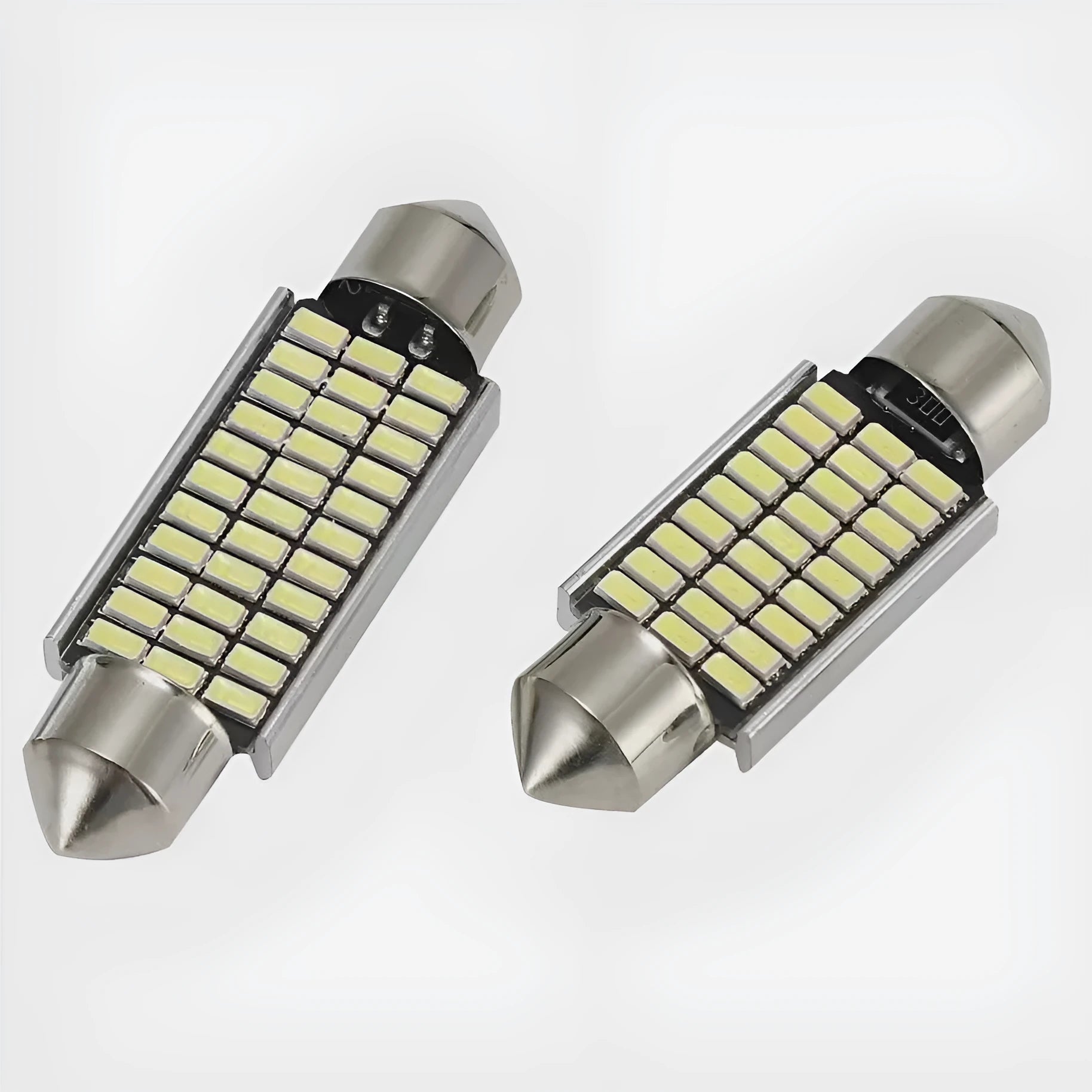 Car interior LED decoder light with aluminium housing and double-tip metal connector in white.