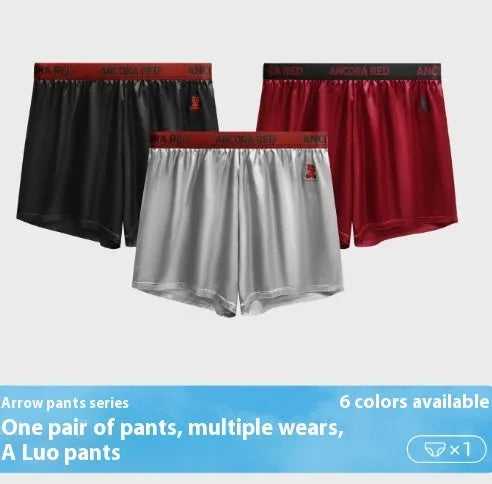 Men's solid colour boxer briefs in black on a mid-waist mannequin, showing knit polyester fabric.