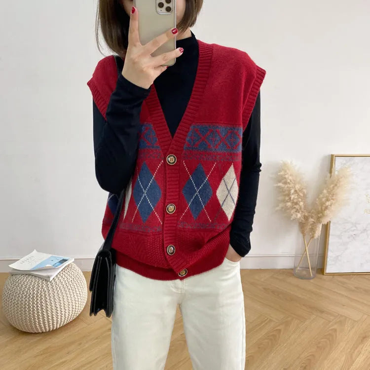 Diamond plaid pattern sleeveless cardigan top in khaki colour, laid flat.