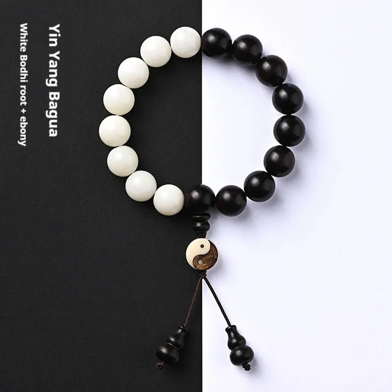 Handmade bodhi seed bracelet with 11mm mixed yuan beads including white palm seeds and carved blackwood elements