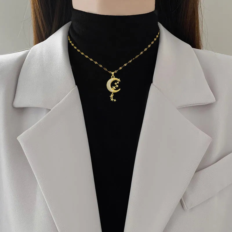 A218 moon pendant necklace with geometric diamond accents on stainless steel chain