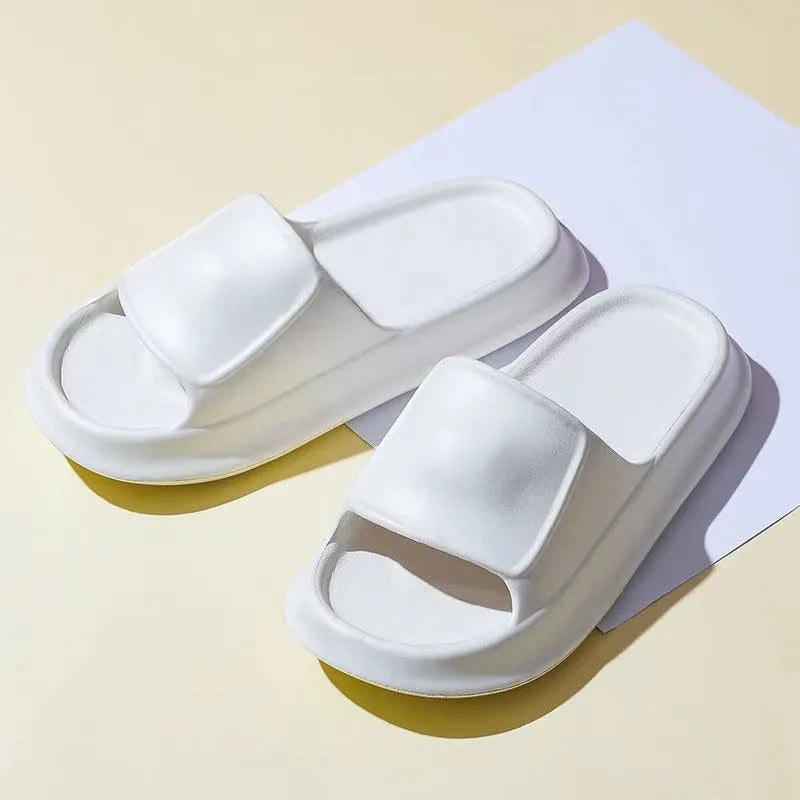 Thickened EVA flip-flop slippers in multiple colours showing the sole thickness.