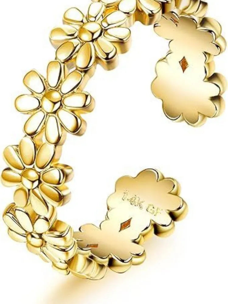 Geometric gold plated toe ring with rhinestone or water drop decoration on an alloy band.
