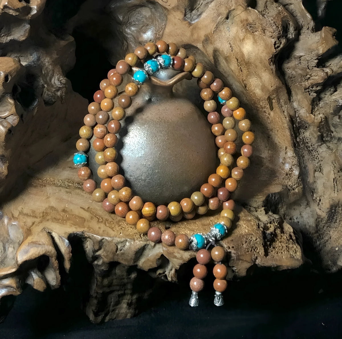 Handmade geometric stone bead bracelet with 108 Lvzhu beads measuring 5-6mm diameter