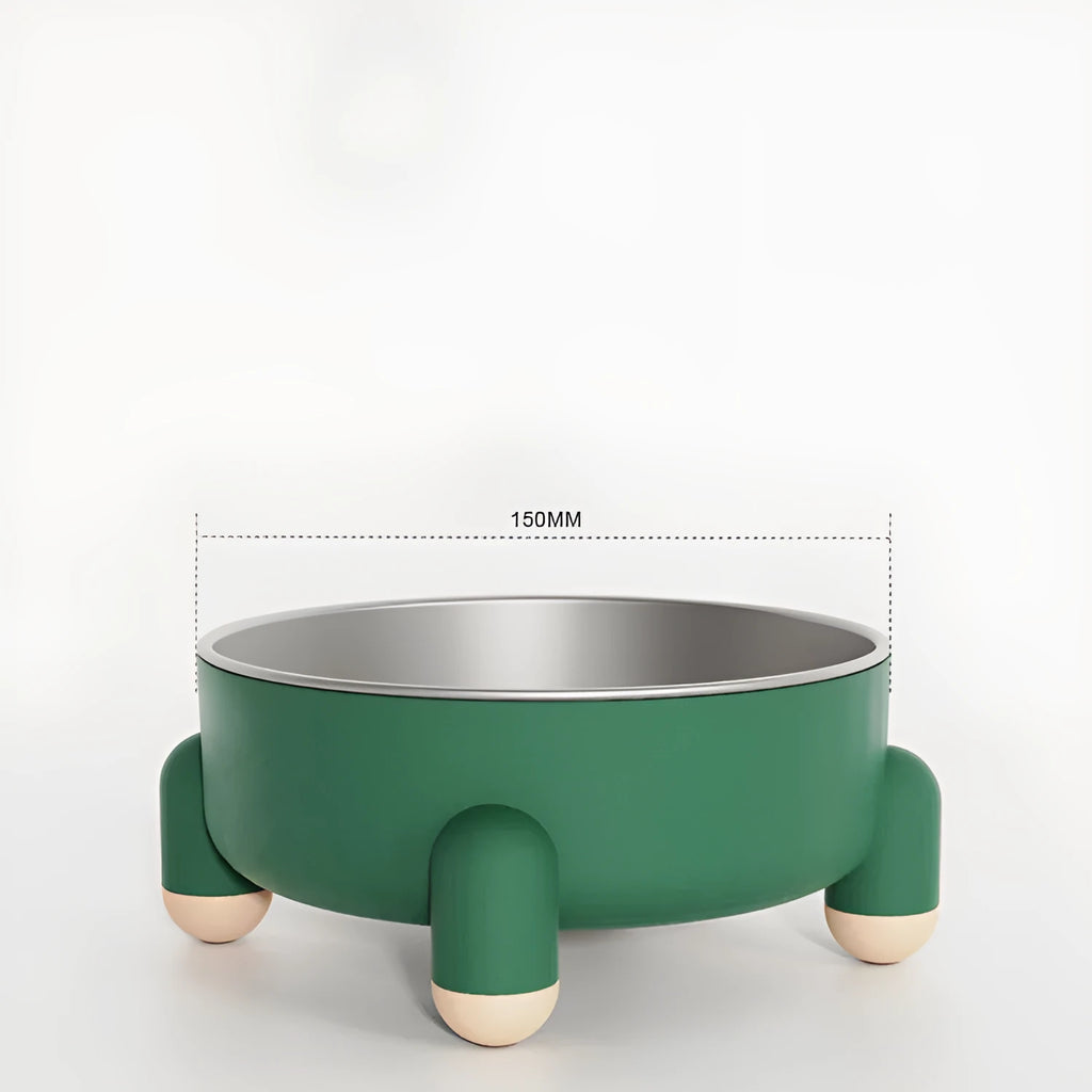 Green stainless steel pet bowl with high foot and non-slip base on a floor