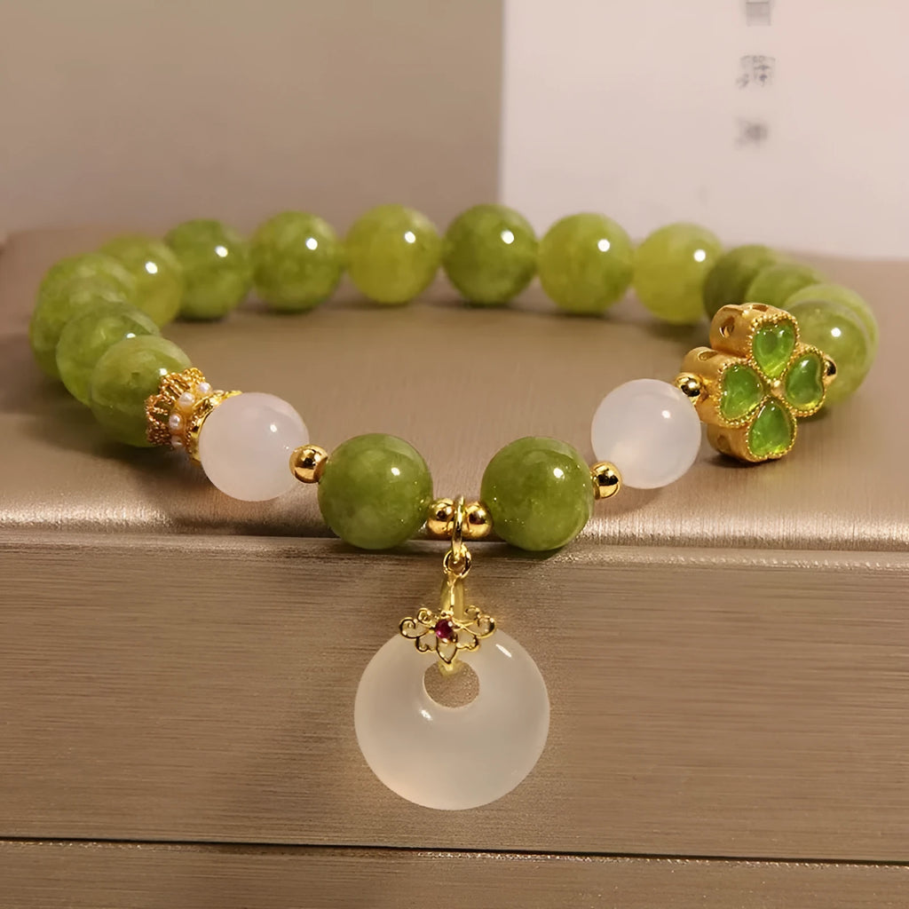 Women's green tourmaline bracelet with a four-leaf clover safety buckle in New Chinese style.
