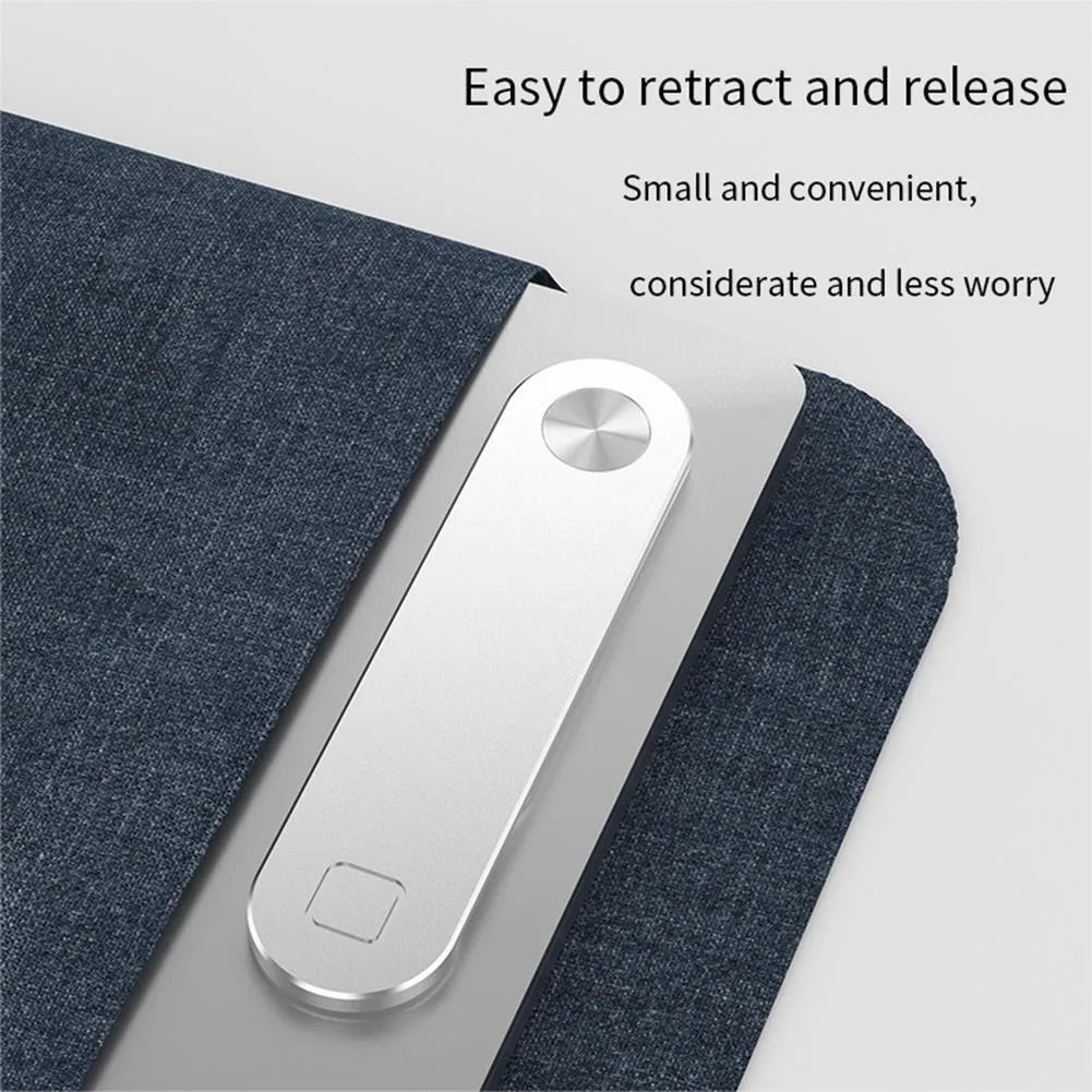 Aluminium laptop phone holder with magnetic clip mounted on laptop edge holding smartphone