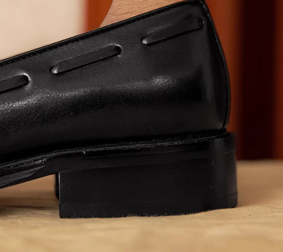 Men's black genuine leather slip-on loafers with fringed detail and rubber sole