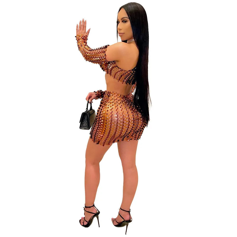 Women's black hollow-out net two-piece dress set with sleeveless top and short skirt.