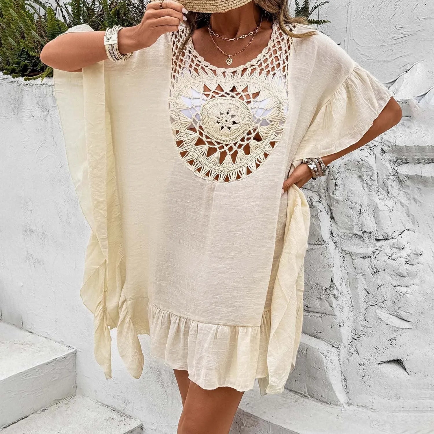 Beach dress swimsuit with patchwork skirt featuring crochet stitching and tassel details
