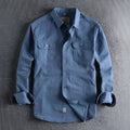 Men's solid colour cotton shirt with cardigan style collar in light blue, showing long sleeves and regular fit