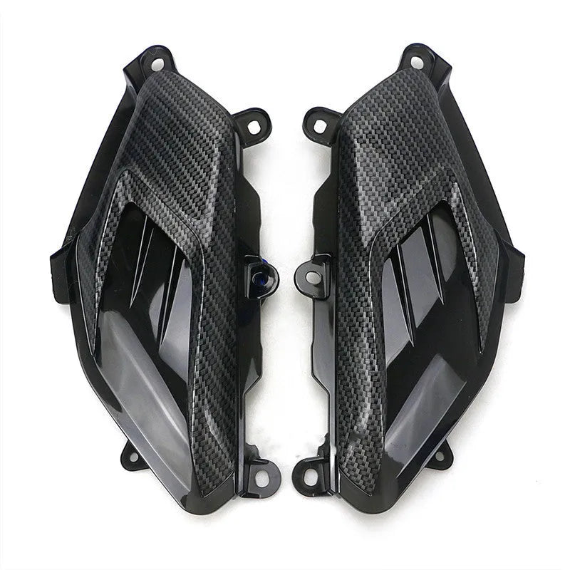 Pair of carbon fibre decorative LED side lamps for Yamaha NMAX125 and NMAX155 scooters.