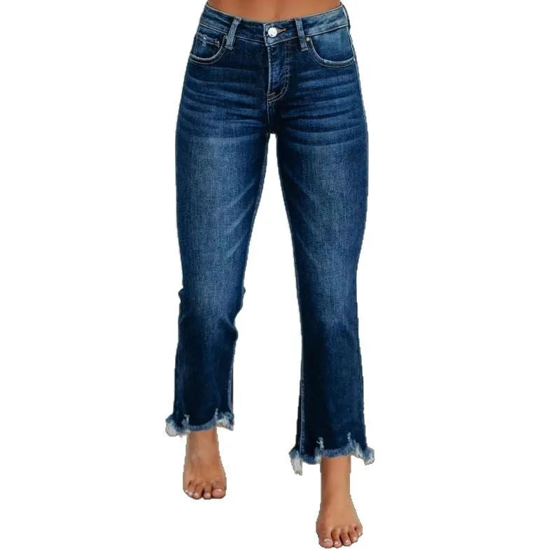 Solid colour women's cotton denim jeans with a hand-distressed finish in dark blue