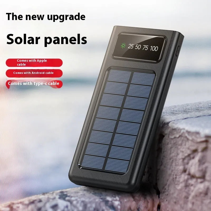 Black and white solar power bank with charging cable showing 20000mAh capacity and solar panel
