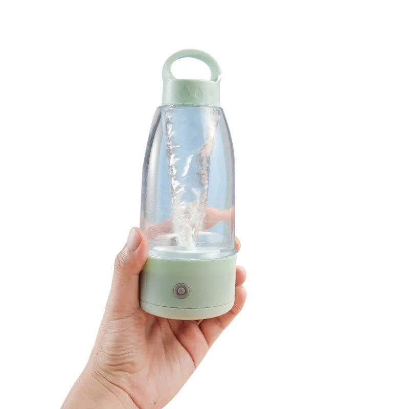 Automatic electric shaker bottle in green, pink, or white with USB charging and handle