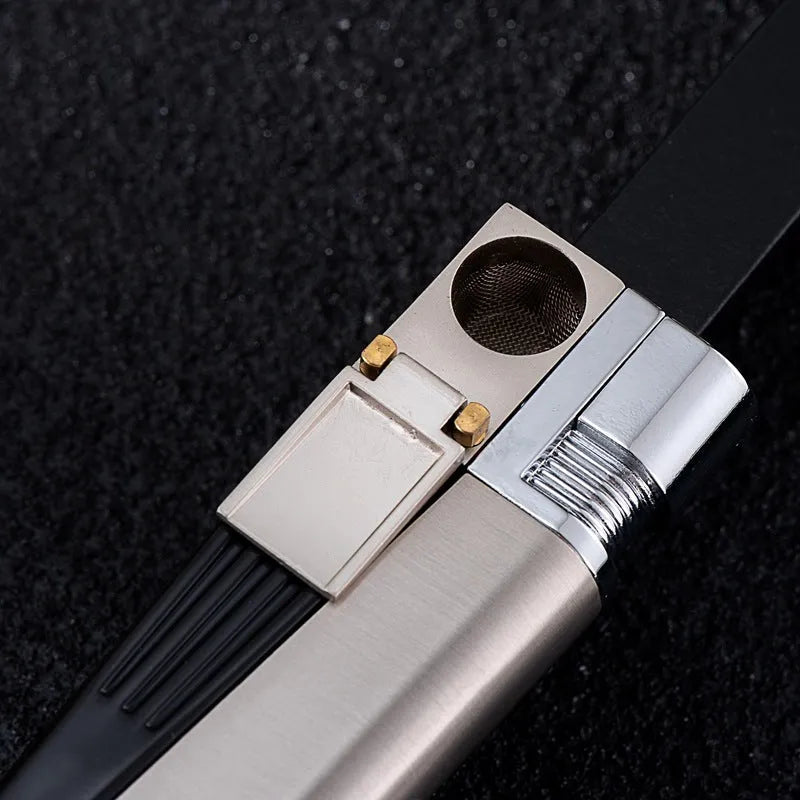 Silver foldable metal pipe lighter shown open, revealing lighter mechanism and small storage compartment.