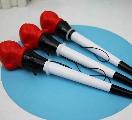 Set of four black boxing press ejection pens with bullet-shaped 0.7mm tips on a white surface.
