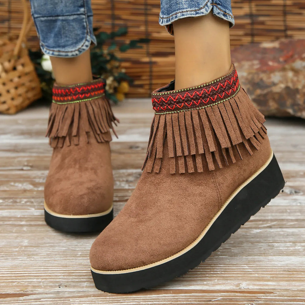 Dark brown suede women's wedge ankle boots with side zip and tassel on a waterproof platform sole.