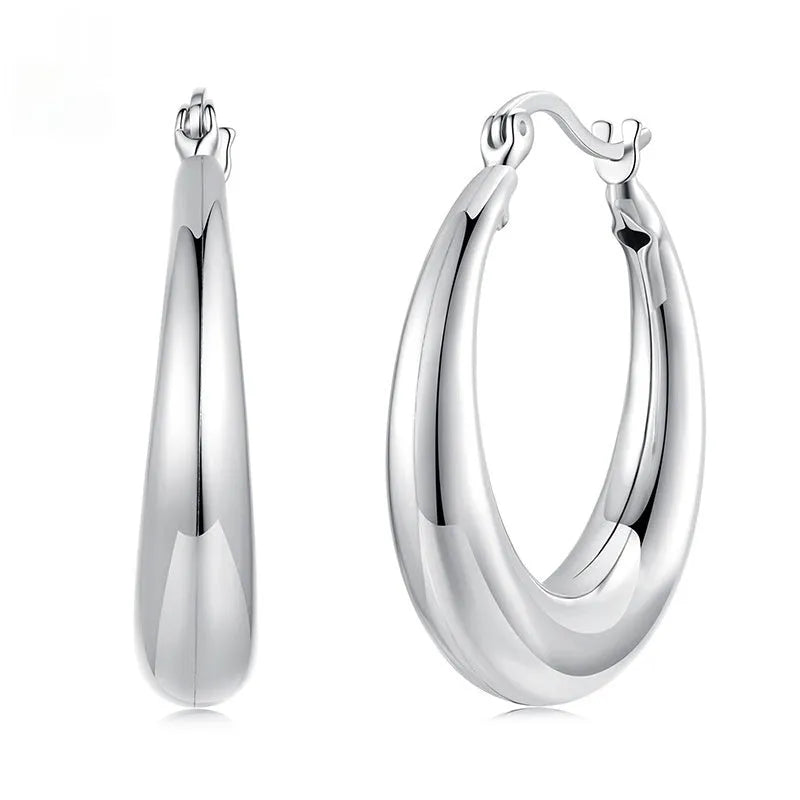 Silver-tone geometric ring clip-on earrings for women, shown in three sizes.