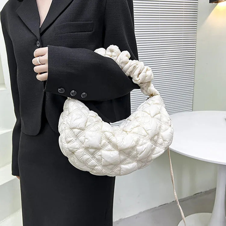 Women's light beige nylon messenger bag with long shoulder strap, shown with dimensions 35cm wide by 20cm high.