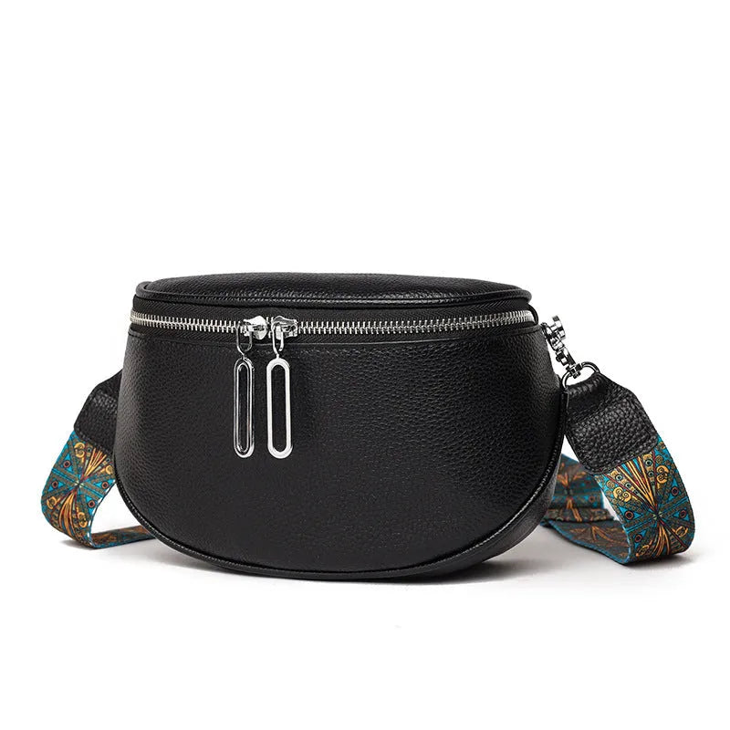 Women's saddle-shaped PU leather messenger bag in black with crossbody strap