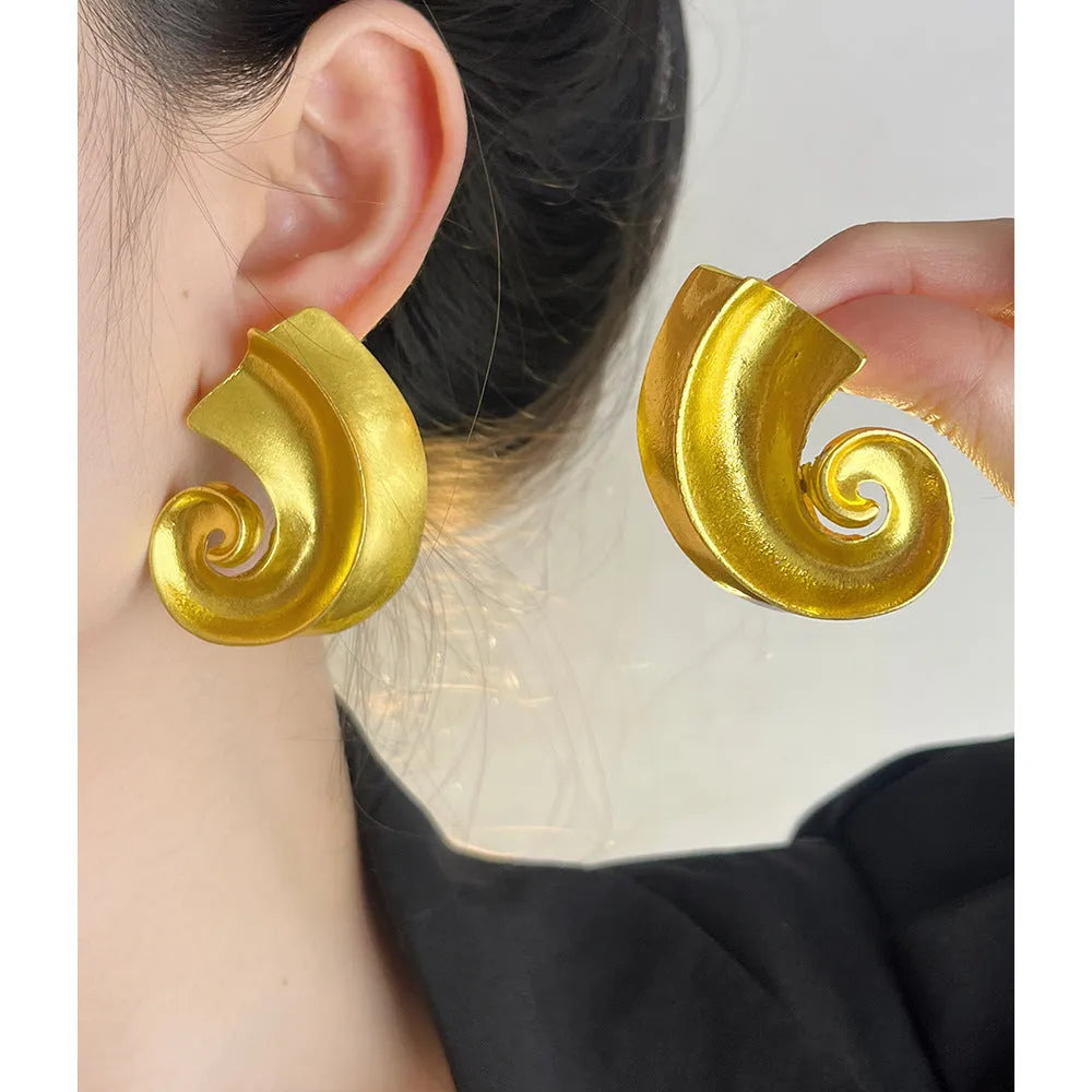 Retro geometric alloy ear studs measuring 5cm in gold and silver electroplated finishes.