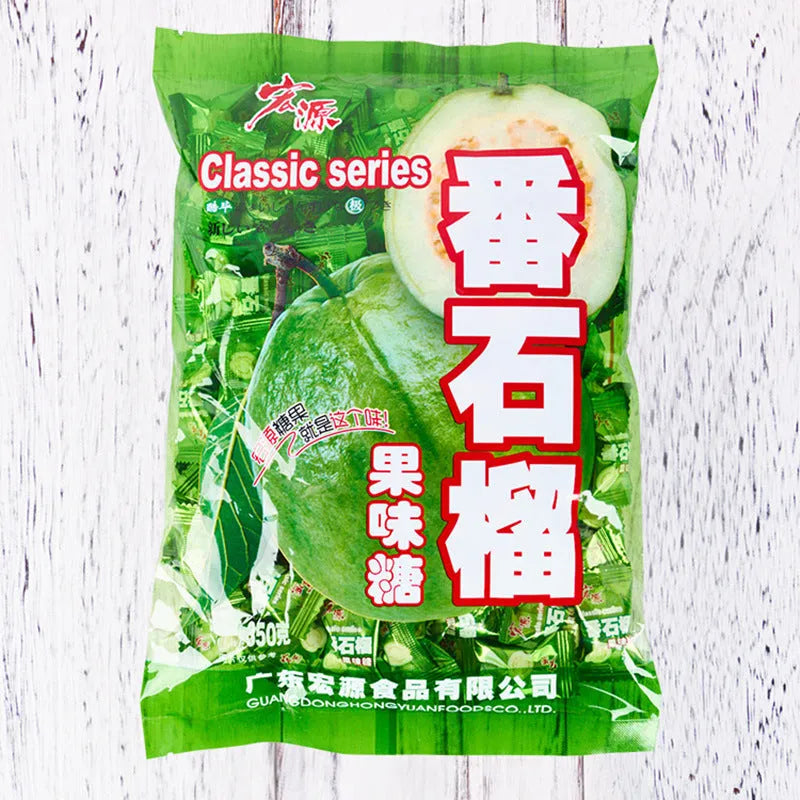 Assortment of guava, plum sugar, and tangerine peel hard candies in a gift pack bag.