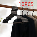 Elegant black non-slip anti-rust clothes hanger on a white background.