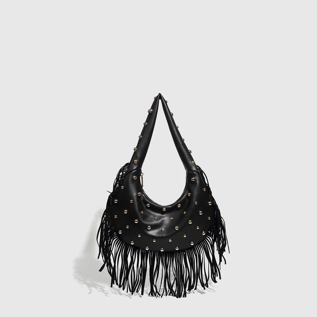 Retro black shoulder handbag with tassel detail and internal mobile phone pocket.