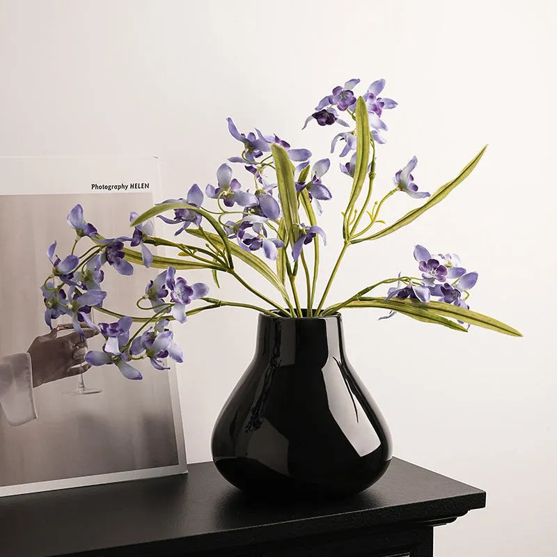 Ceramic decorative vase with glass surface finish in black or white colour with modern simplicity design