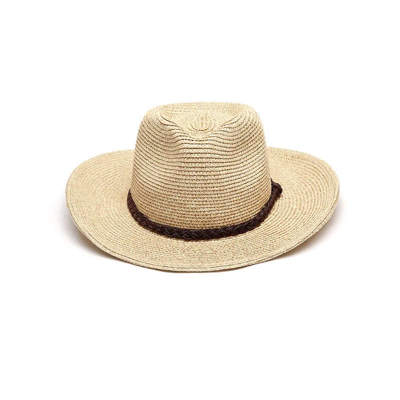 Men's foldable wide brim straw sun hat in beige, shown in a travel context.