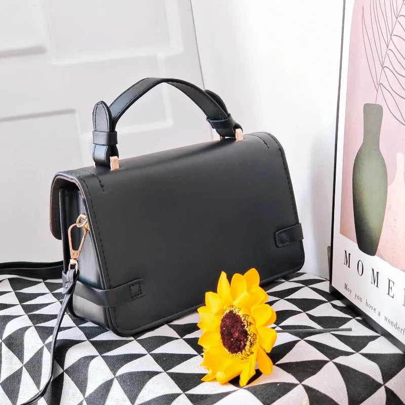 Retro ethnic pattern crossbody bag in horizontal square shape with file compartment.