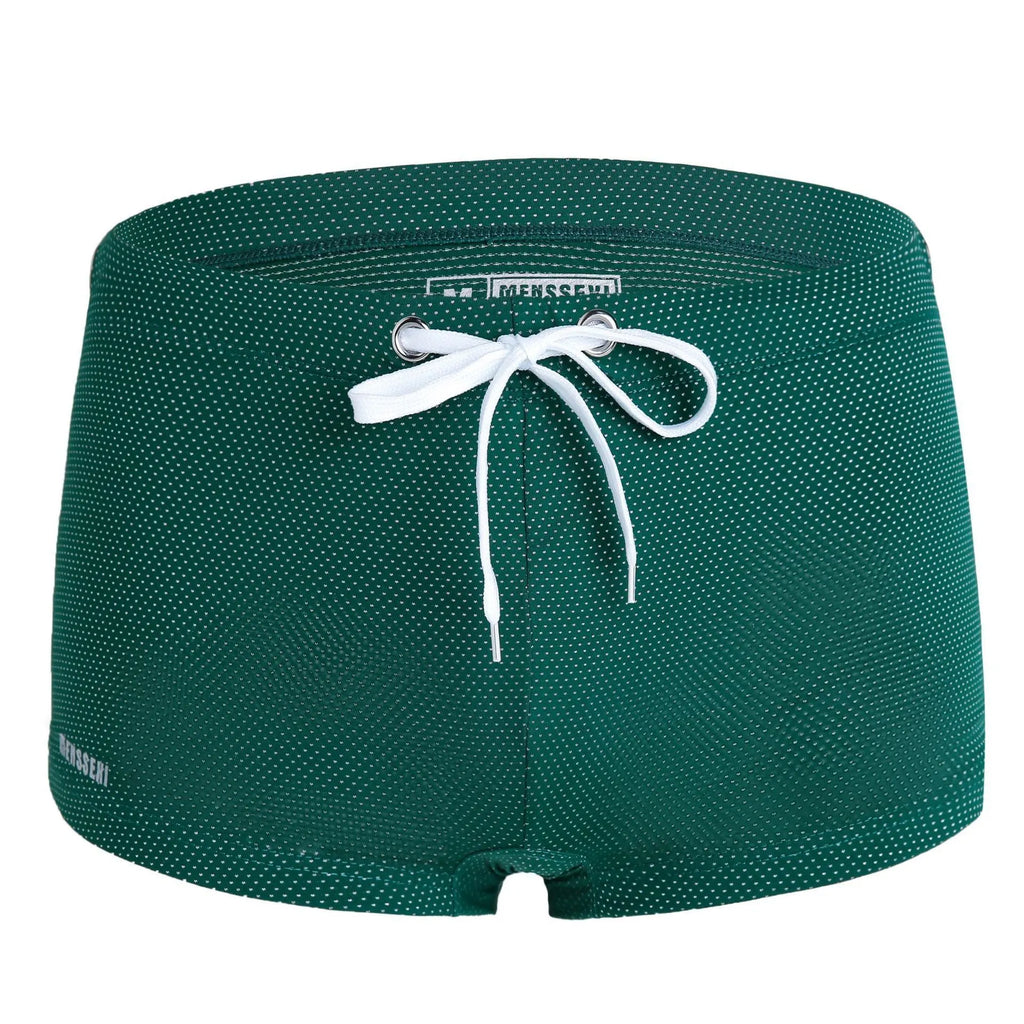 Man's low-waist nylon lace swimming trunks in a boxer brief style, shown in a solid colour.