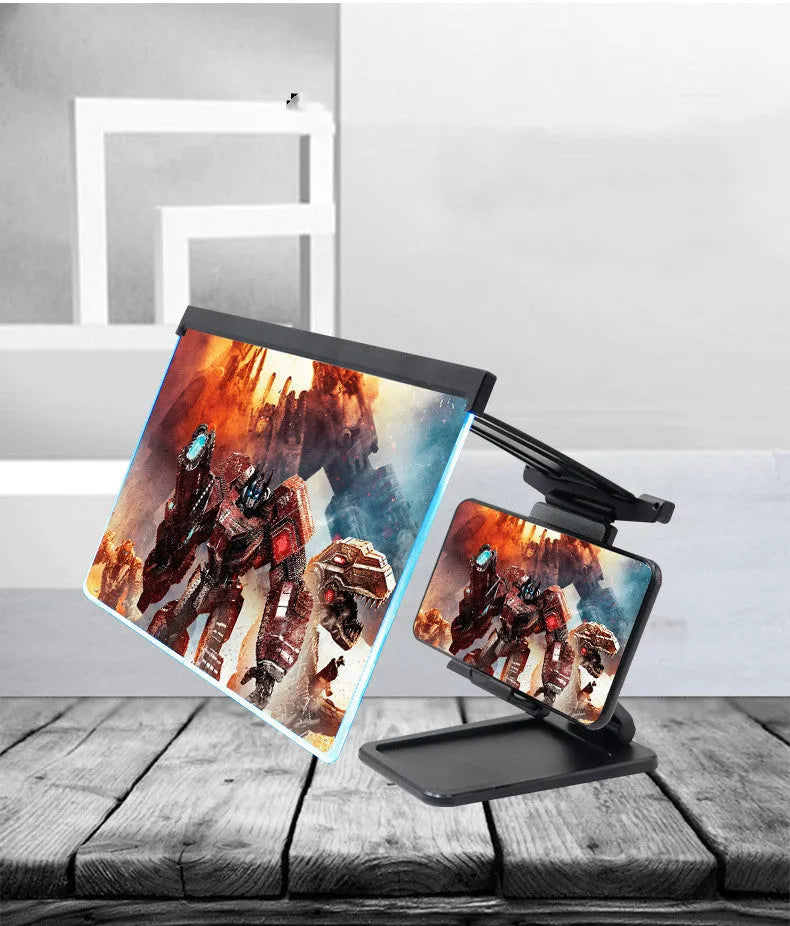 Black folding mobile phone screen amplifier and adjustable holder on a desktop, magnifying a smartphone display.